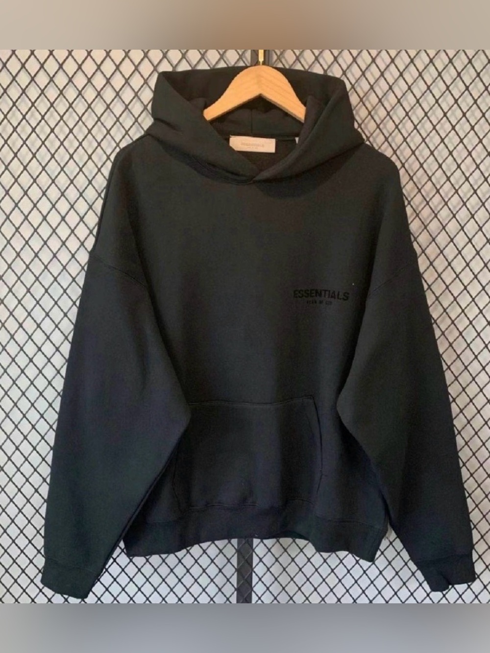 Essentials Men’s Black Hoodie with Subtle Chest Logo
